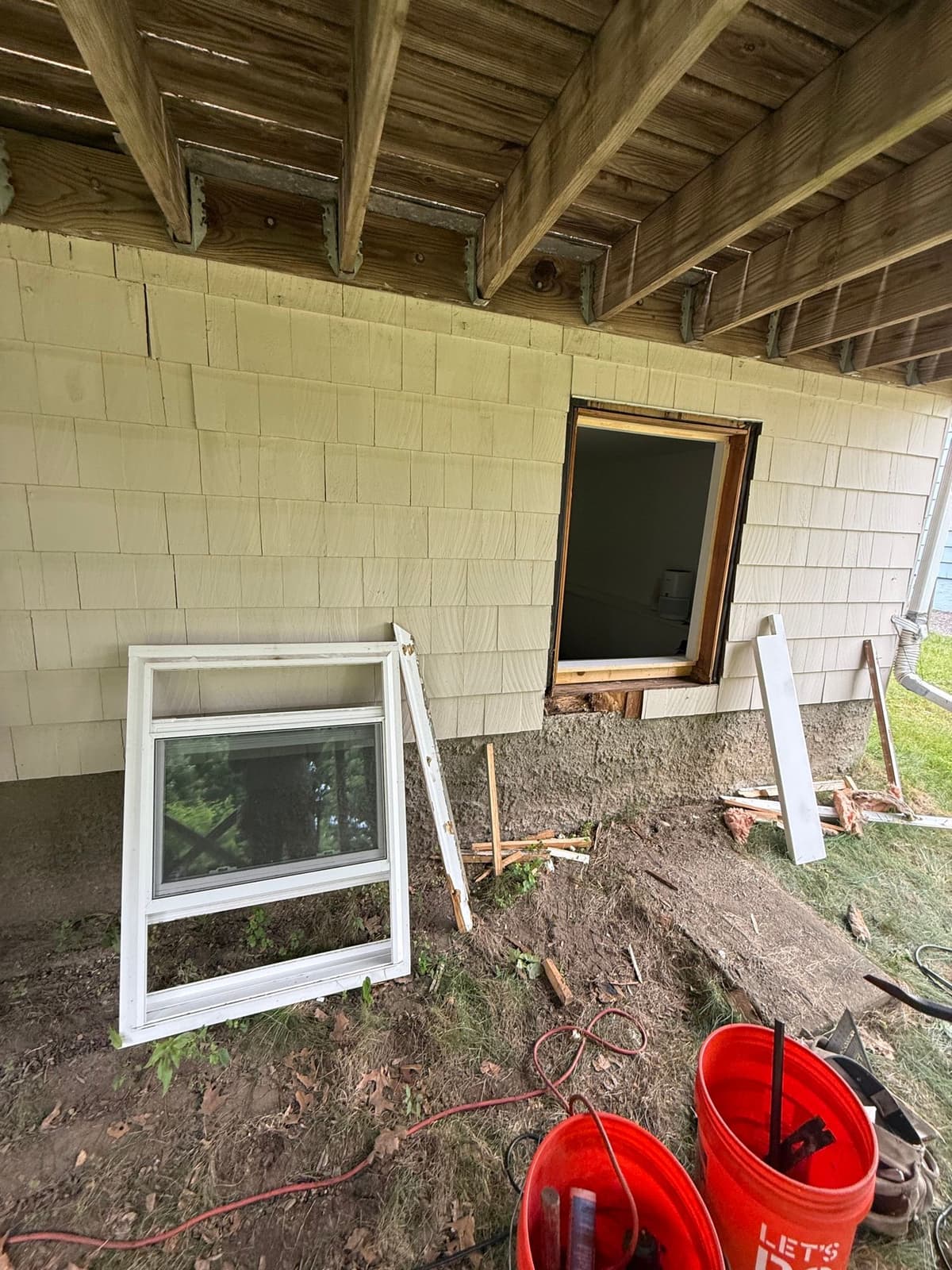 Window and old trim removed, opening ready to rebuild.