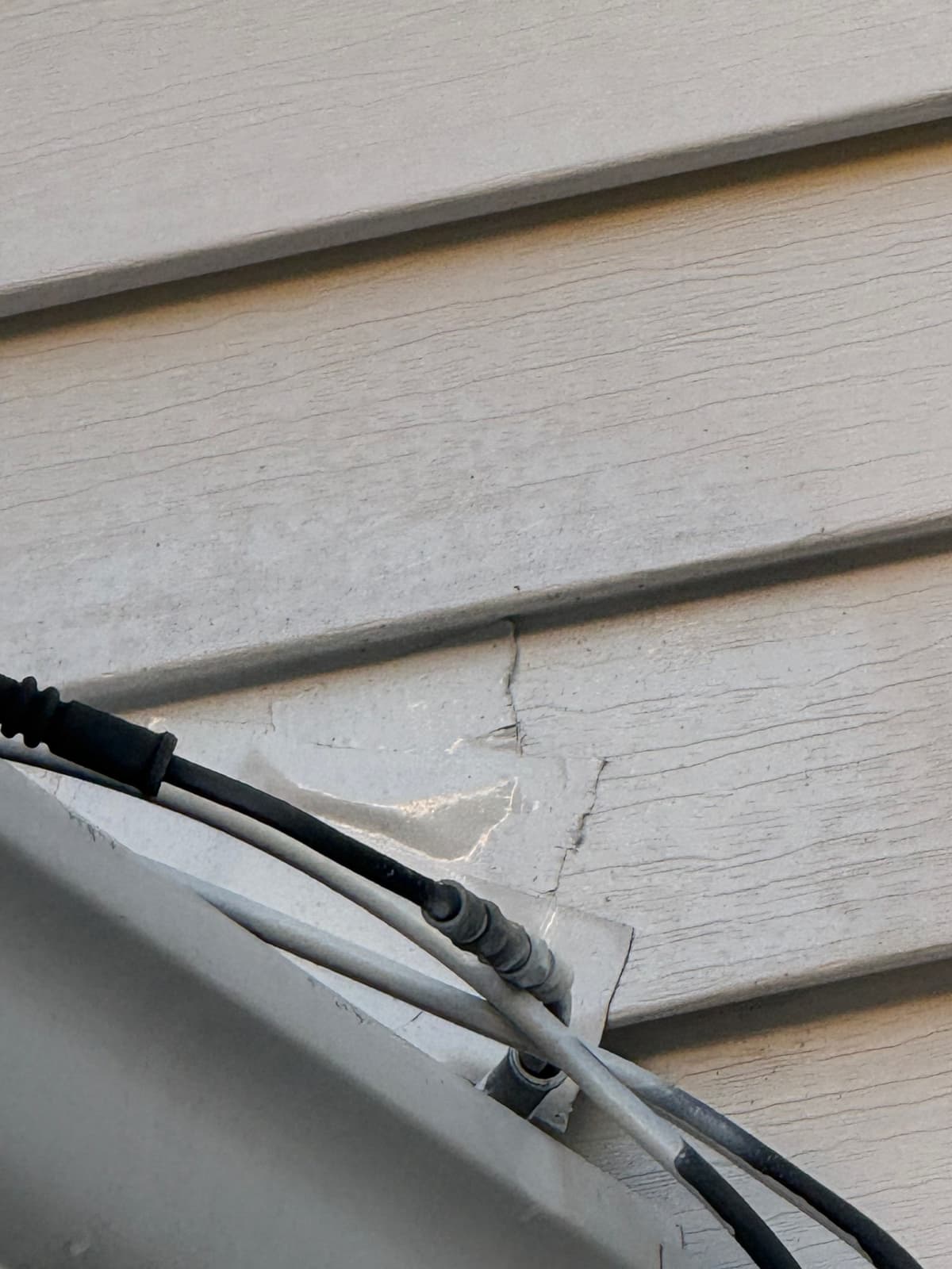 Before: siding repair project in Stoughton, MA
