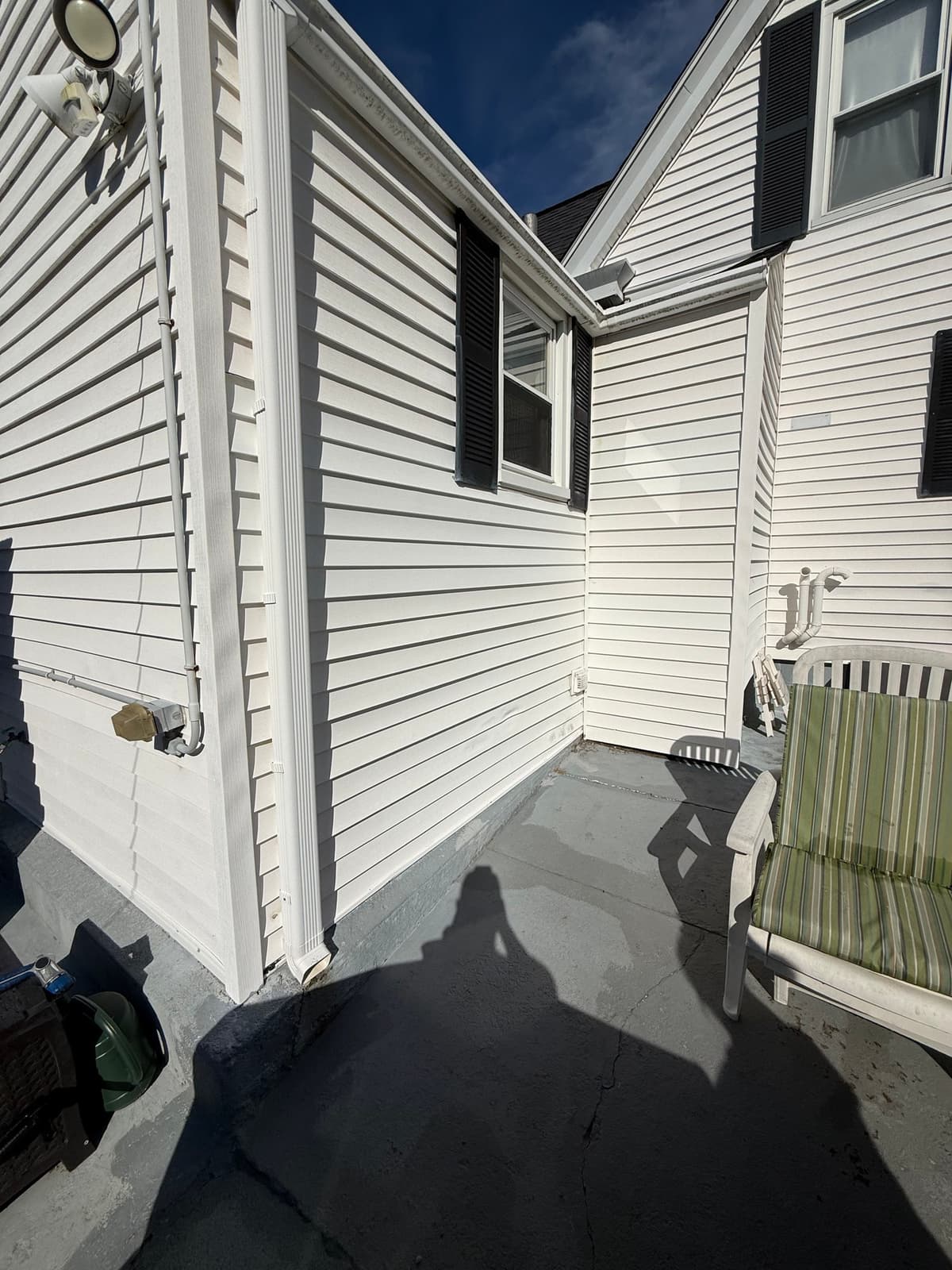 Before: siding repair project in Stoughton, MA